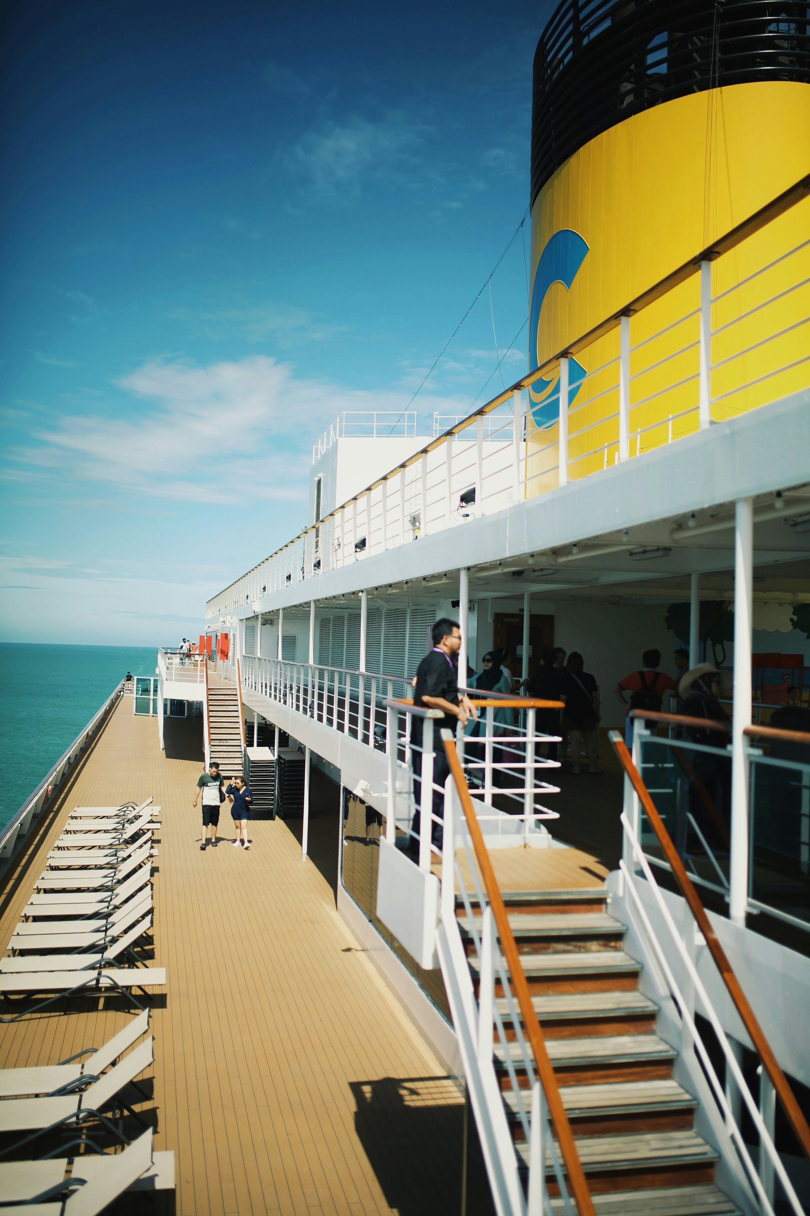final day disembarkation on a cruise ship with luggage ready in the corridor
