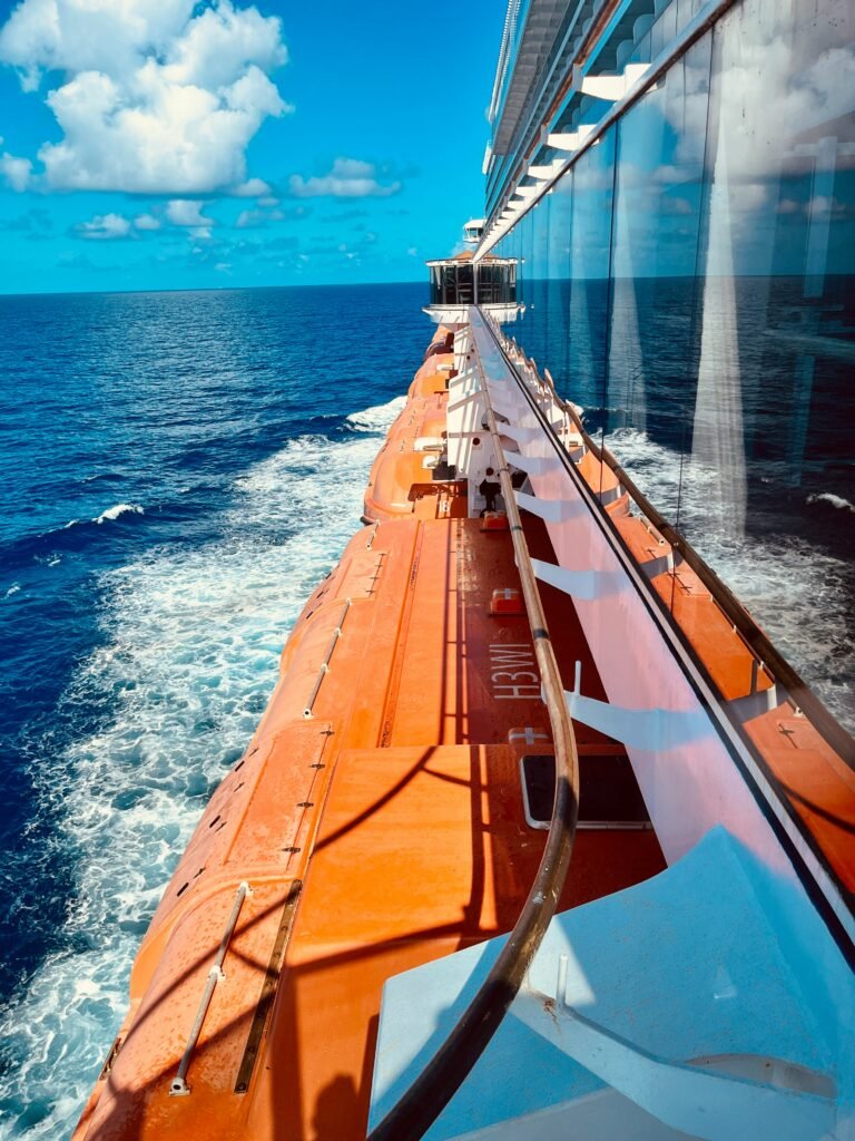 Muster station sign showing the assigned emergency assembly point on a cruise ship